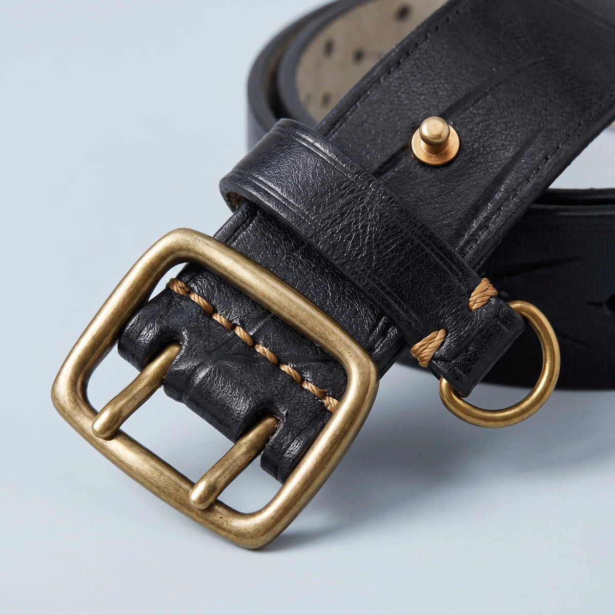 Corvane Perforated Belt Buckle Detail