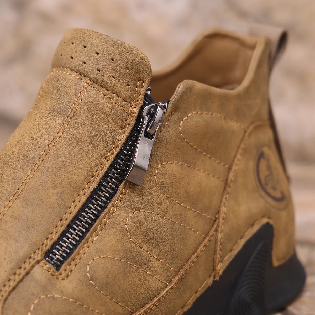 Thorne Stitched Boot tan, close-up of the side zip and stitched panels