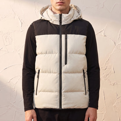 Ashcombe Utility Vest in Cream - padded sleeveless vest with detachable hood worn by a model