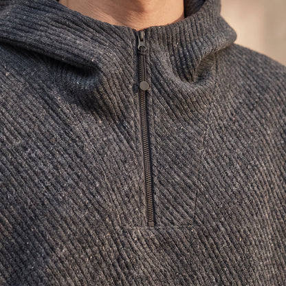 Ostrel Textured Hoodie close up of the quarter zip and diagonal ribbed knit texture