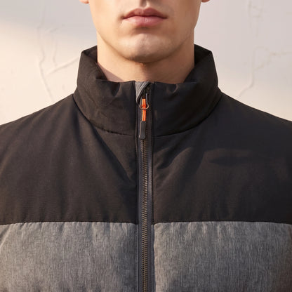 Halvard Padded Vest close-up detail - stand collar, yoke seam and copper zip pull