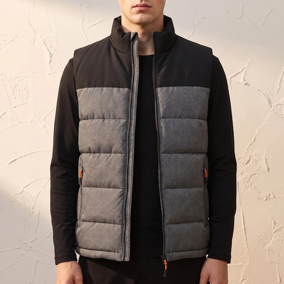 Halvard Padded Vest in Black - quilted sleeveless vest with black contrast yoke worn by a model