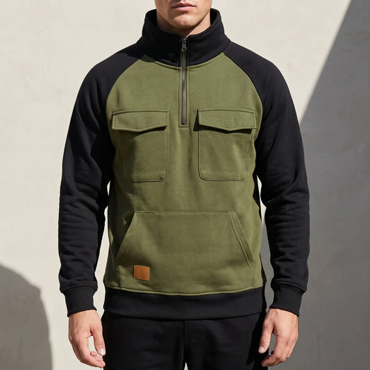Calvano Half-Zip Sweatshirt in Green - olive funnel-neck pullover with black raglan sleeves worn by a model