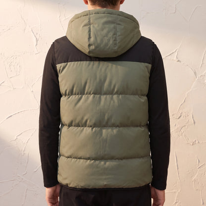 Ashcombe Utility Vest in Green - back view showing hood and vertical quilted baffles