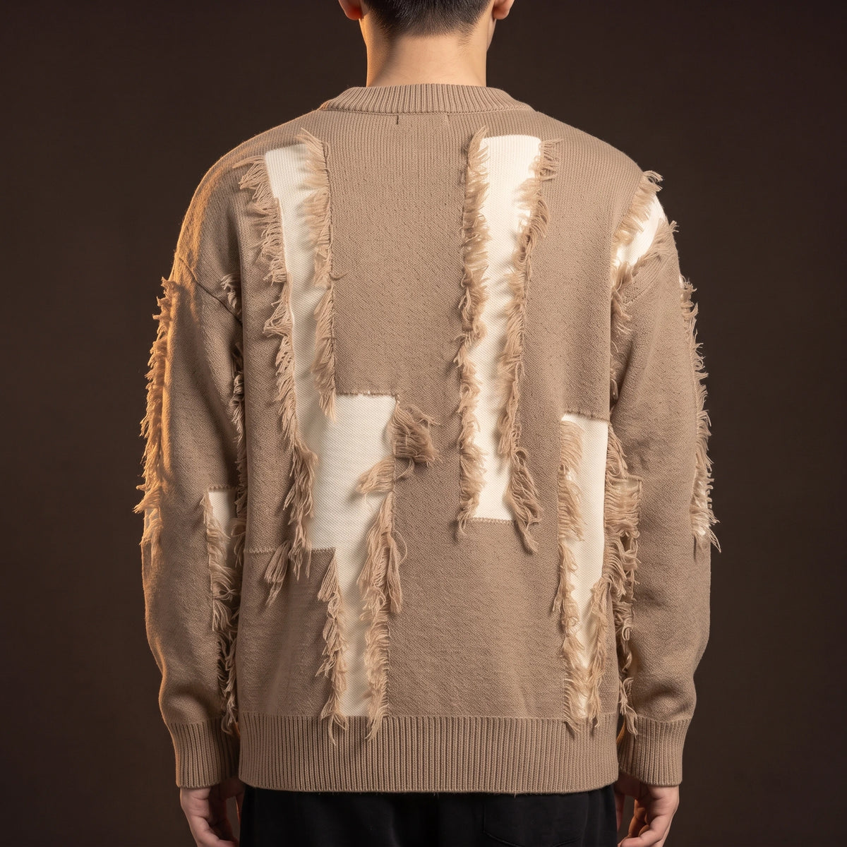 Verrick Distressed Sweater back view showing the same torn distressing across the back panel