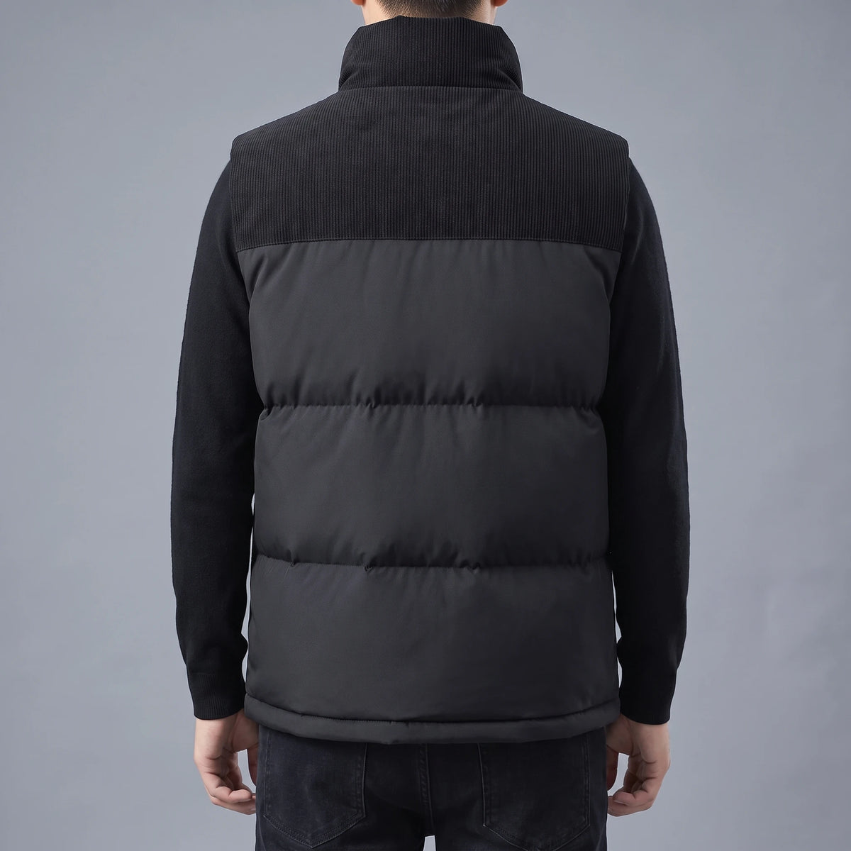 Brennick Puffer Vest back view with corduroy shoulder yoke