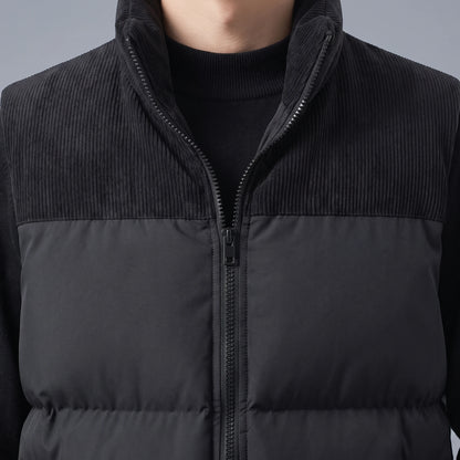 Brennick Puffer Vest close up of corduroy collar and yoke against the puffer body