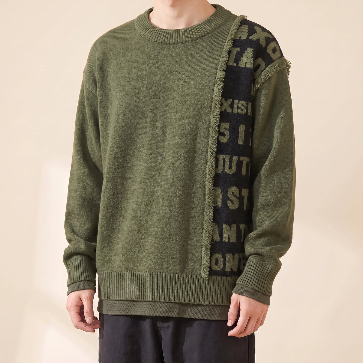 Brixton Fringe Sweater in army green with black letter panel, men's crew-neck knit sweater with a fringed letter panel, front view