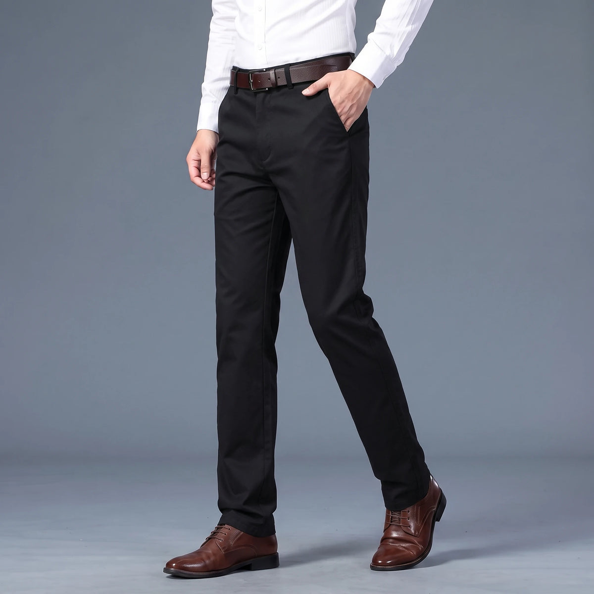 Callum Slim Chino in black, men's slim flat-front chino trousers worn with a white shirt, front view