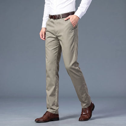Callum Slim Chino in green, men's slim flat-front chino trousers worn with a white shirt, front view
