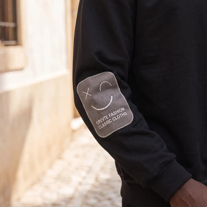 Corwin Classic Crewneck black, close-up of Classic sleeve patch