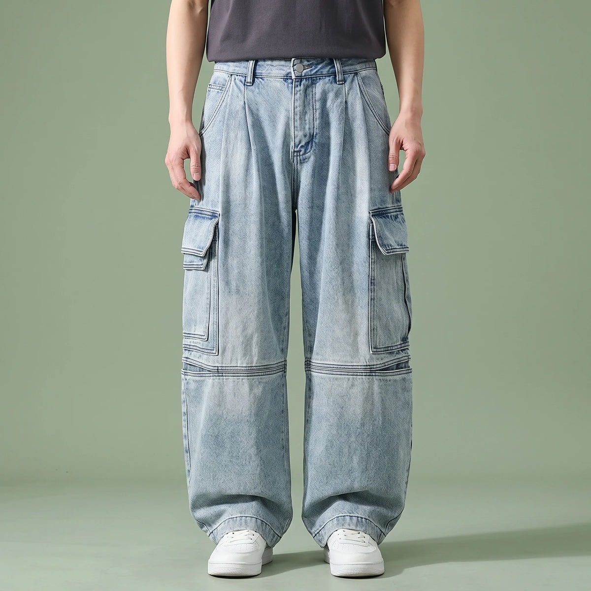 Dalton Baggy Cargo Jean in light blue, men's baggy wide-leg cargo jeans with flap pockets and panelled knees, studio shot