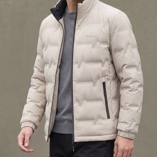 Halden Down Puffer in beige, men's short quilted puffer jacket with dark stand collar, worn open