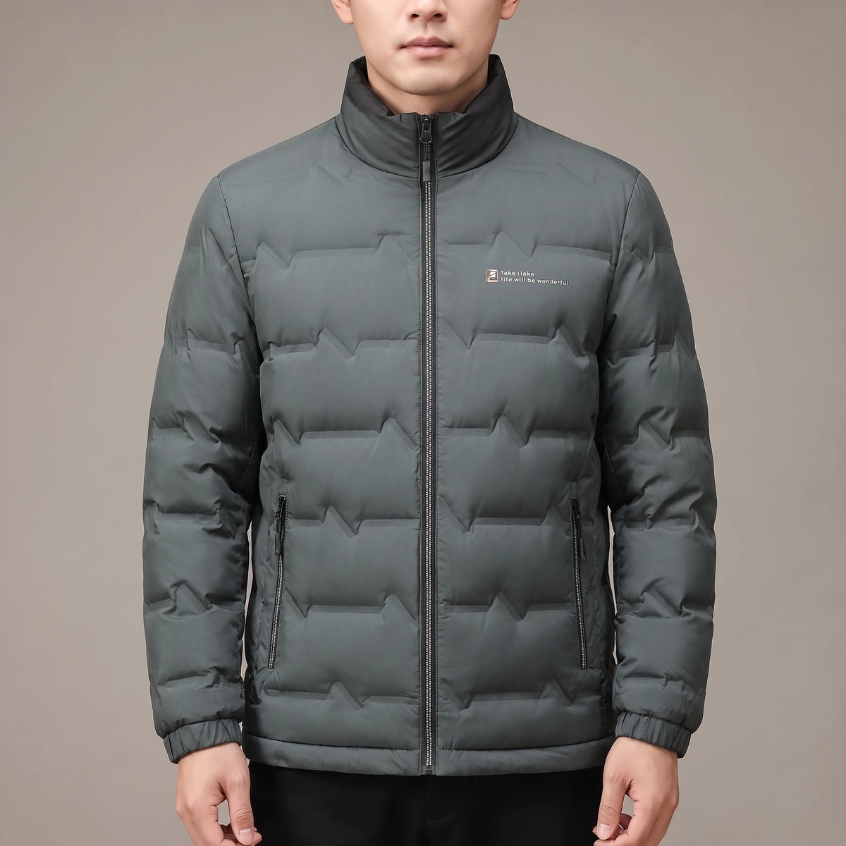 Halden Down Puffer in green, men's sage short quilted puffer jacket, worn in studio