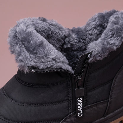 Halvard Fur-Lined Boot in black, men's quilted slip-on ankle boot with plush lining and side zip, close-up of the plush collar and side zip