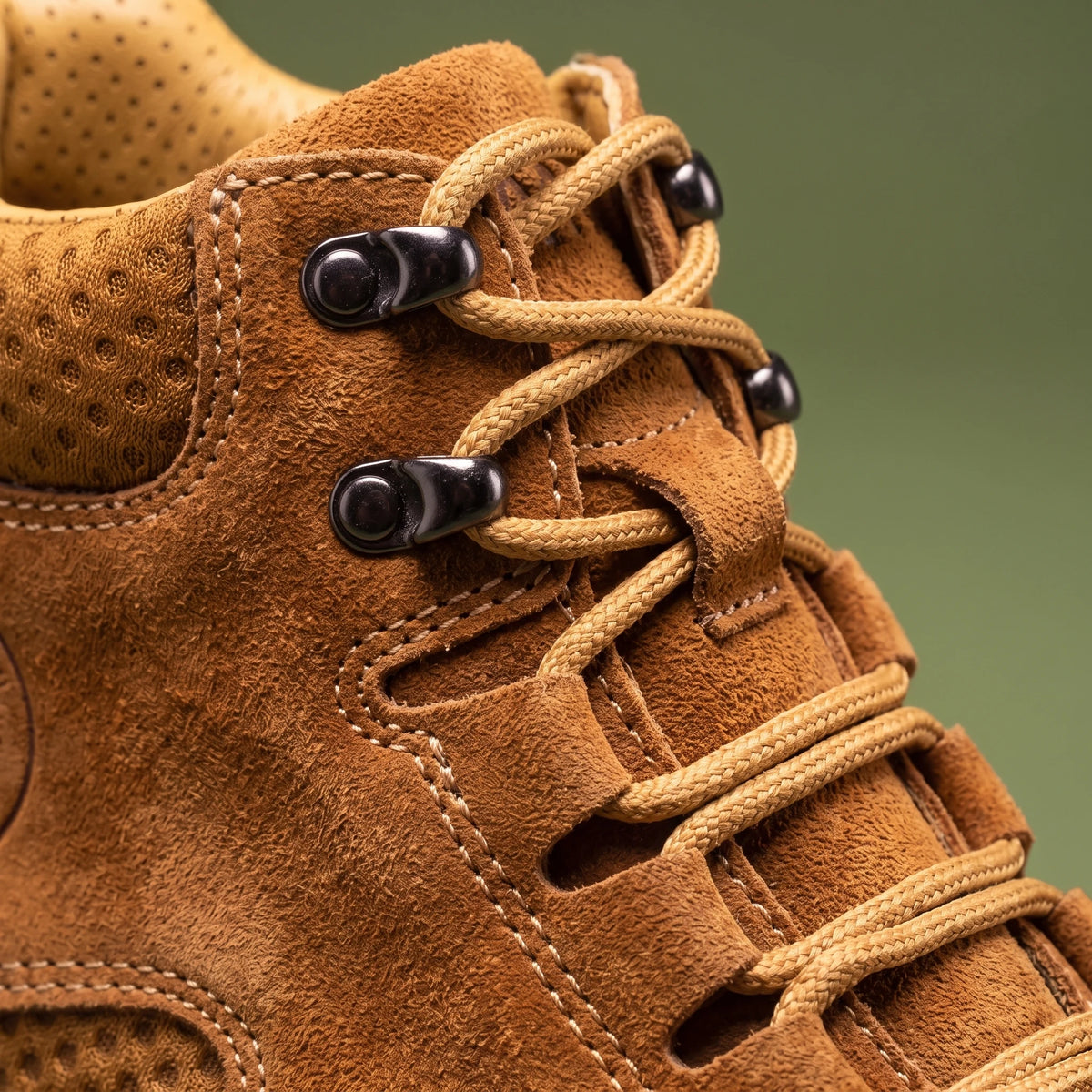 Maddox Lace-Up Boot close-up of metal lace hooks, laces and padded mesh collar