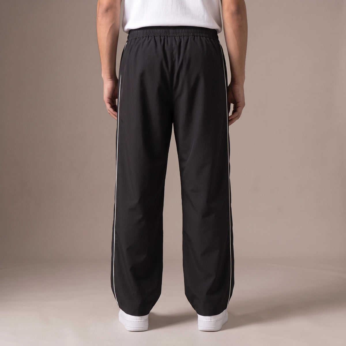 Merrick Piped Track Pant back view, men's wide-leg track pants with elastic waist