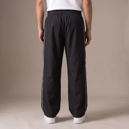Merrick Piped Track Pant back view, men's wide-leg track pants with elastic waist