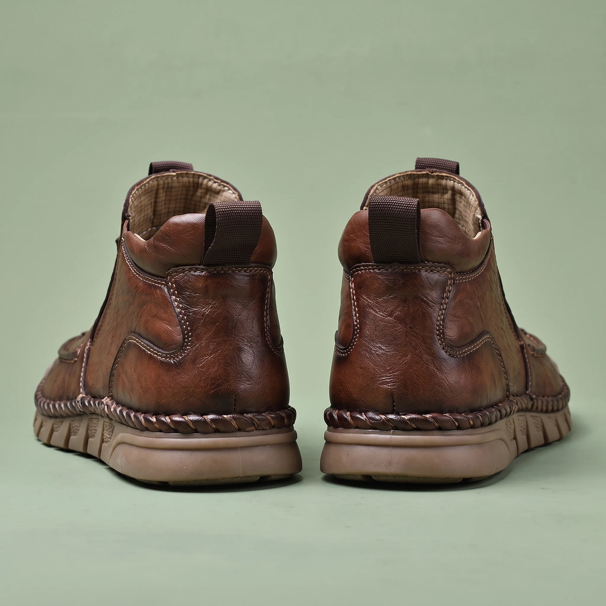 Oswin Leather Chukka brown, pair back view showing heel pull tabs