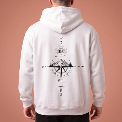 Solane Compass Hoodie in white, oversized pullover with black compass and mountain line drawing across the back panel, worn by model