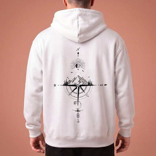 Solane Compass Hoodie in white, oversized pullover with black compass and mountain line drawing across the back panel, worn by model