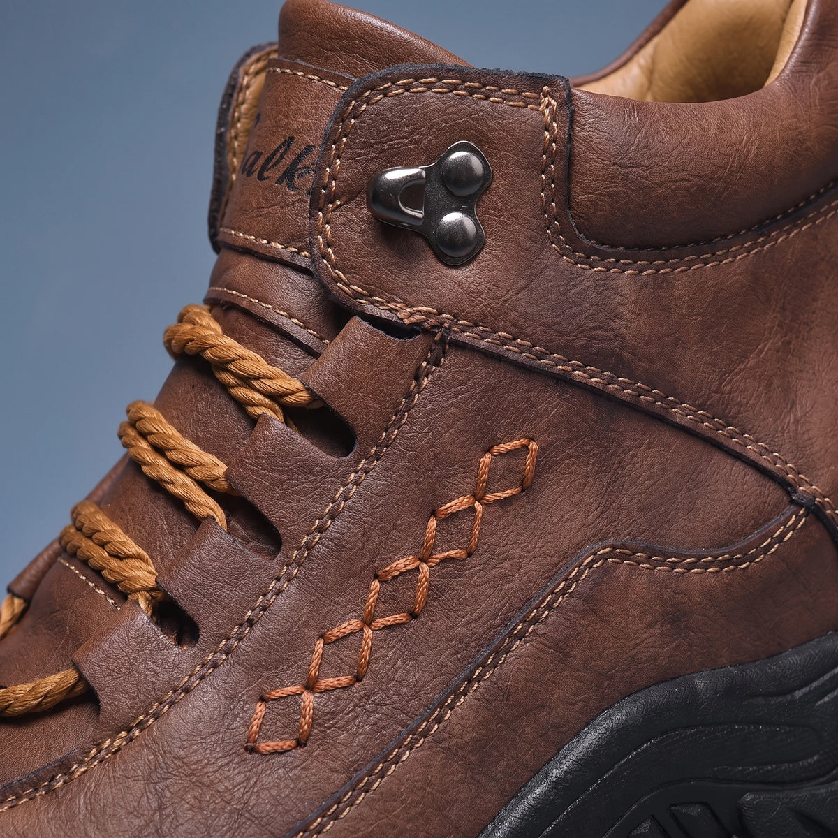 Tarrow Trail Shoe close-up of stitched side detail, metal lace hook and padded collar