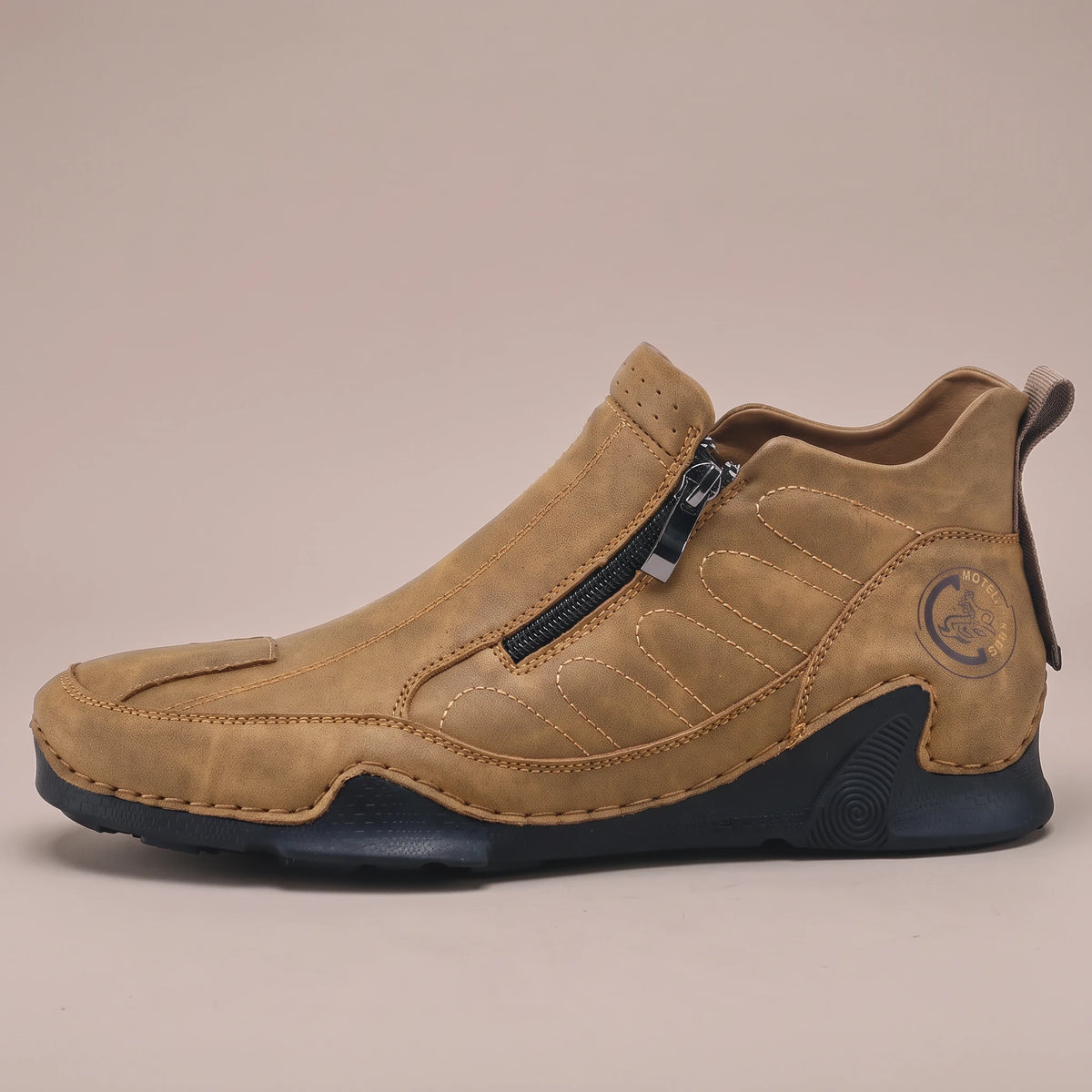 Thorne Stitched Boot in tan, men's slip-on ankle boot with side zip and stitched panels, side view