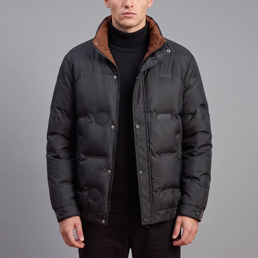Torvald Down Jacket in black, men's goose down puffer with stand collar and rust-brown collar lining, worn front view