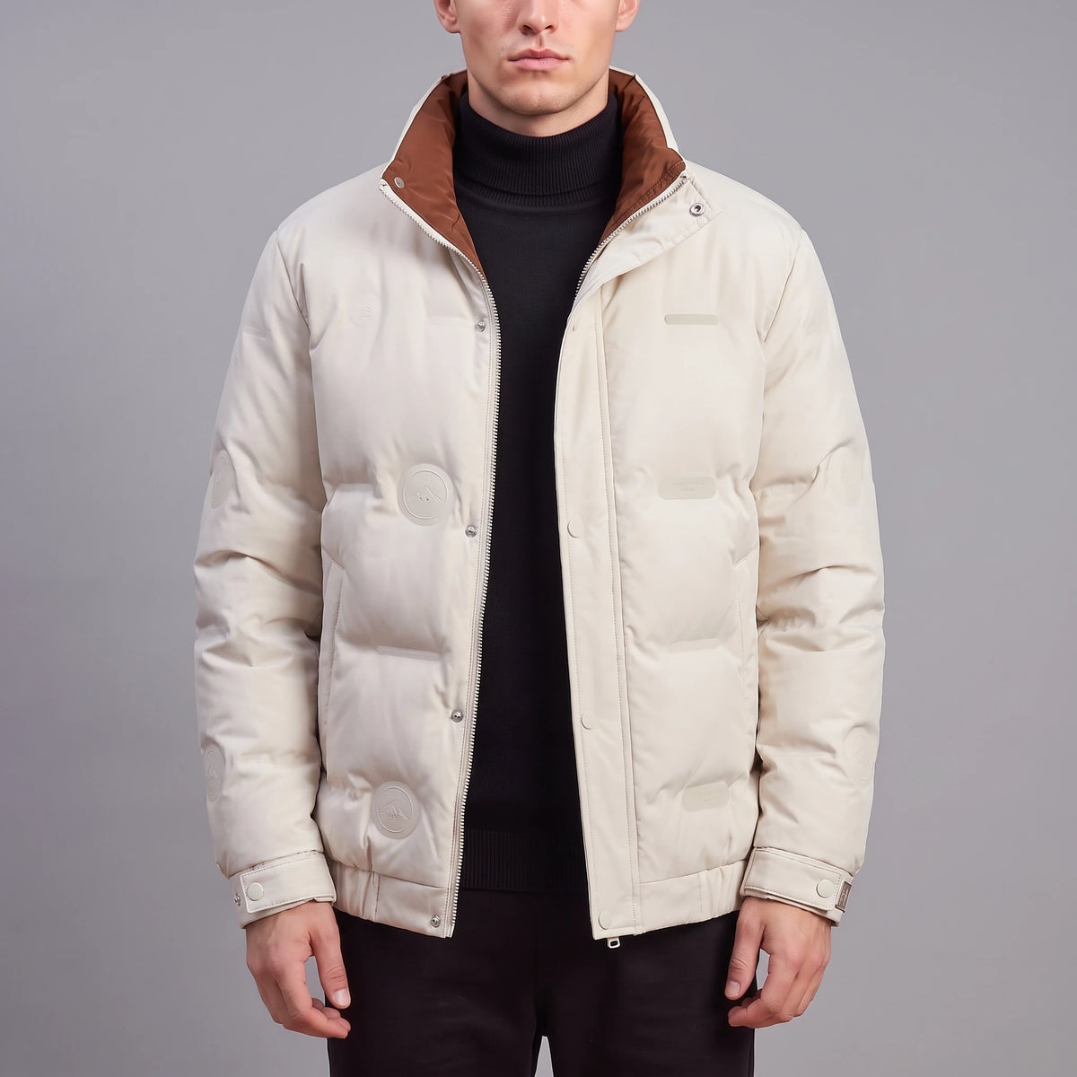 Torvald Down Jacket in cream, men's cream goose down puffer with rust-brown collar lining, worn front view