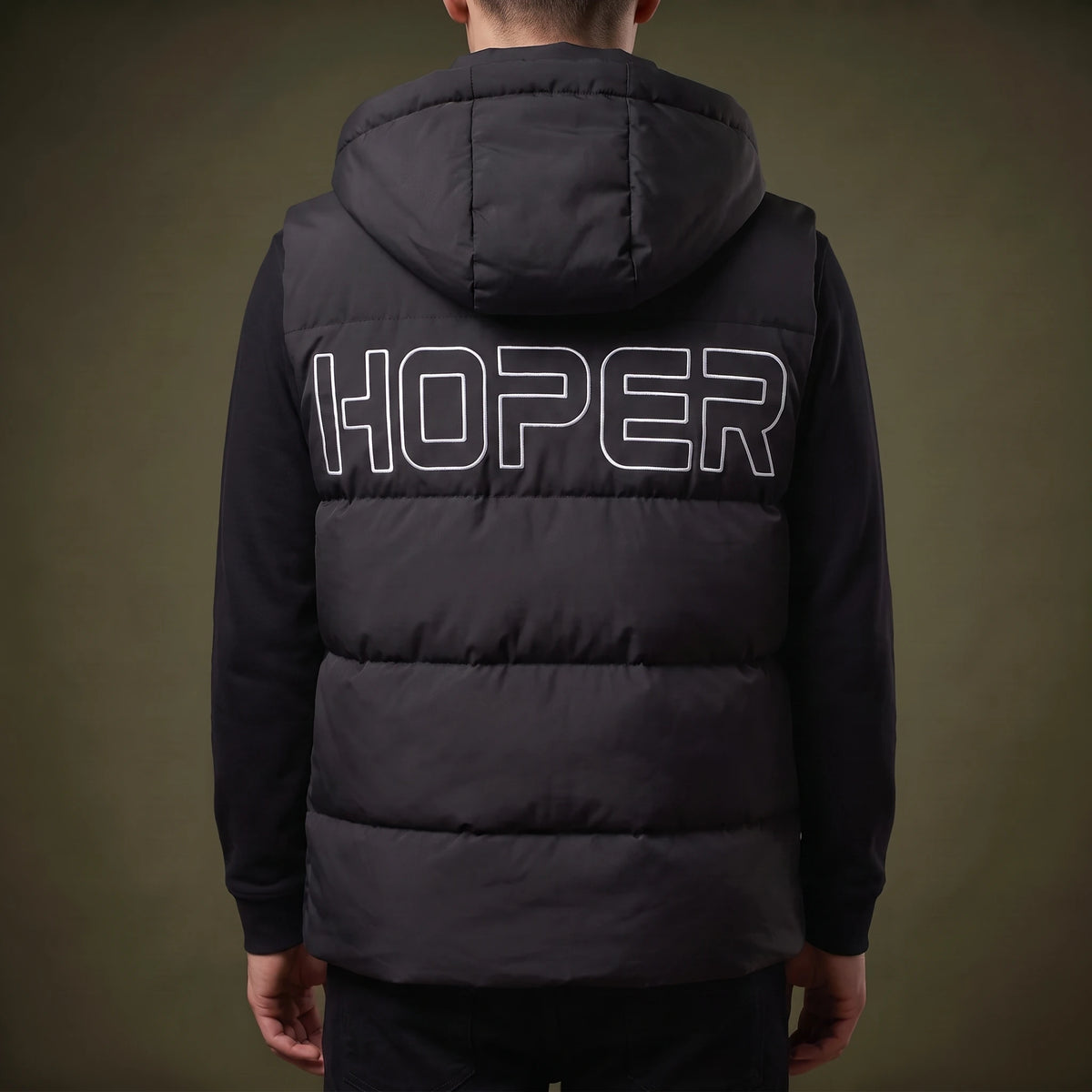 Norvell Hooded Gilet back view showing the quilted back panel and hood worn down