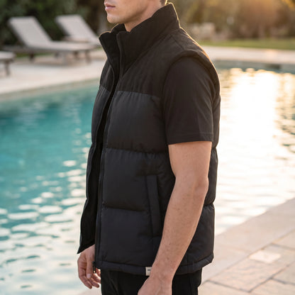 Brancourt Puffer Vest in Black - side view showing patch pocket and bound armhole