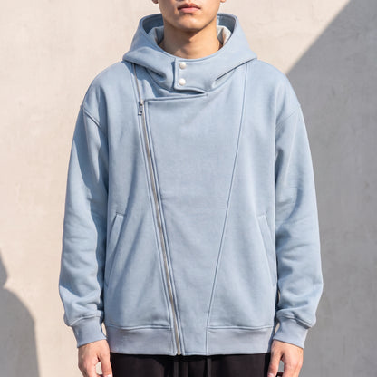 Solteri Collared Hoodie in Blue, oversized bonded fleece hooded jacket with asymmetric diagonal zip and snap storm collar, worn front view