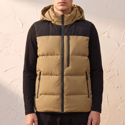 Ashcombe Utility Vest in Tan - padded sleeveless vest with detachable hood worn by a model