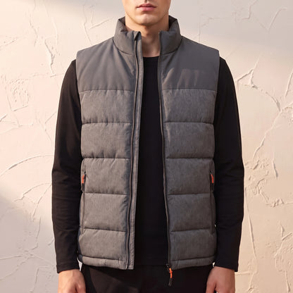 Halvard Padded Vest in Grey - quilted sleeveless vest with grey contrast yoke worn by a model