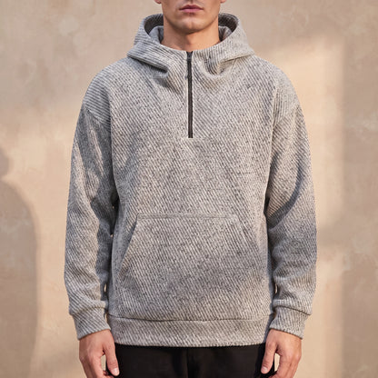 Ostrel Textured Hoodie in Grey, oversized speckled diagonal-rib knit hoodie with quarter zip, worn front view